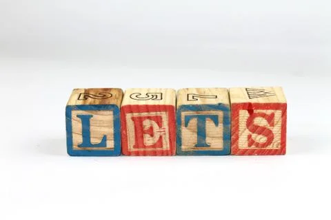Wooden Alphabet Block Spelling LETS,ABC's blocks. Foto stock