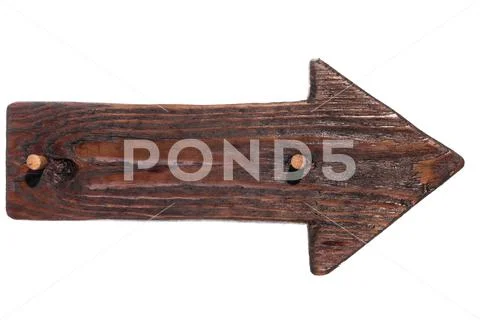 Wooden arrow, the pointer of wood with a wooden gag. Isolated Stock Photos