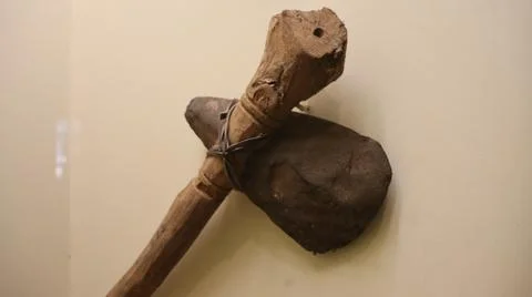 Wooden axe used in the stone Age. Stock Photos