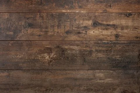 Wooden background. Texture with an old, rustic, brown planks. dark wood textu Stock Photos