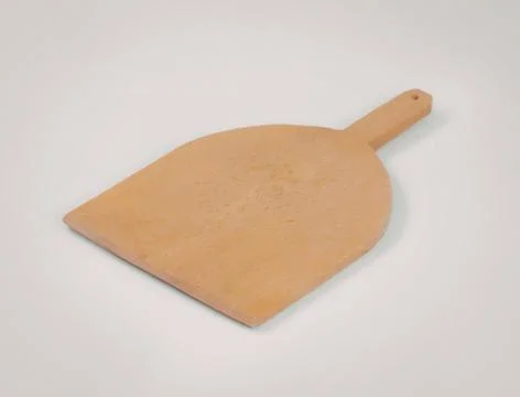 Wooden baking peel on clean surface Stock Photos