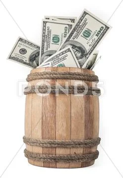 Wooden barrel with hundred dollar bills Stock Photos