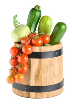 Wooden barrel with vegetables Stock Photos
