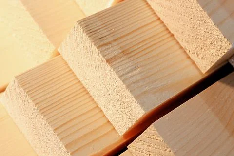 The wooden bars are stacked in a stack. Sawing drying and marketing of wood Stock Photos