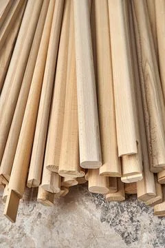 Wooden bars of solid beechwood in carpentry workshop Stock Photos