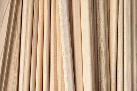 Wooden bars of solid beechwood in carpentry workshop Stock Photos