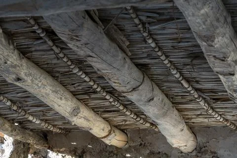 A wooden beam with a pattern of beads on it 스톡 사진