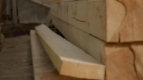 Wooden beams drying process in a workshop setting for construction purposes Stock Footage 324664719