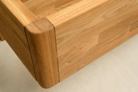 Wooden bed frame corner close up Stock Photos