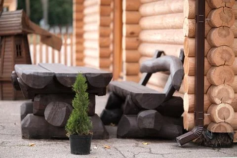 Wooden bench with solid wood table. Production and sale of garden furniture m Stock Photos