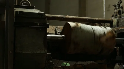 Wooden blank rotates on a wood processing machine to create wooden boxes Stock Footage 126915374