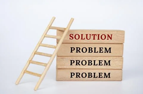 Wooden block with text, problem and solutions. Solutions to problems concept 스톡 사진