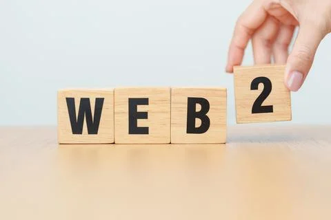 Wooden block of WEB 2. Centralization, Blockchain, Decentralization, Social.. Foto stock