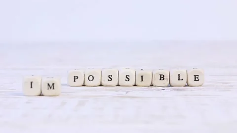 Wooden Blocks with (Im)Possible Sign Video stock 171874367