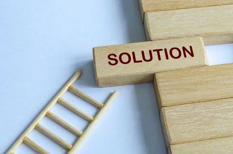 Wooden blocks with ladder representing progress toward solutions, goals, an.. 库存照片