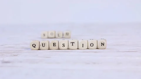Wooden Blocks with Question and Solution Sign Video stock 170597539