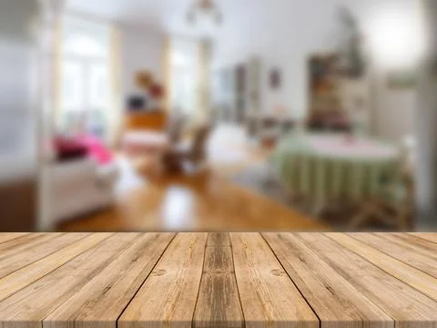 WOODEN BOARD EMPTY TABLE IN FRONT OF BLURRED DINING ROOM BACKGROUND Stock Illustration