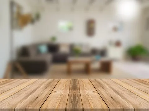 WOODEN BOARD EMPTY TABLE IN FRONT OF BLURRED INTERIOR ROOM BACKGROUND Illustrazione stock