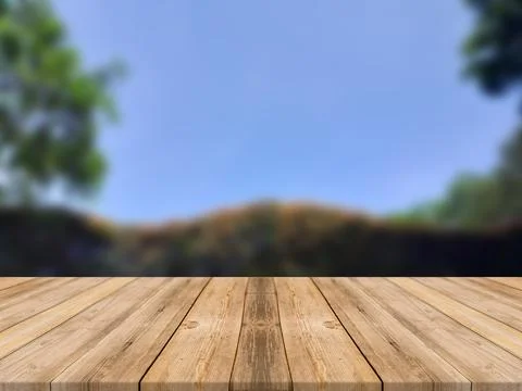 WOODEN BOARD EMPTY TABLE IN FRONT OF BLURRED BLUE SKY BACKGROUND Stock Illustration