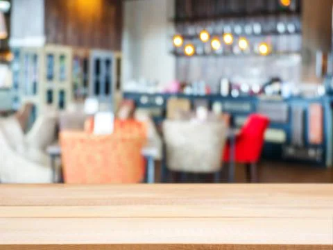 Wooden board empty table in front of blurred cafe 스톡 사진