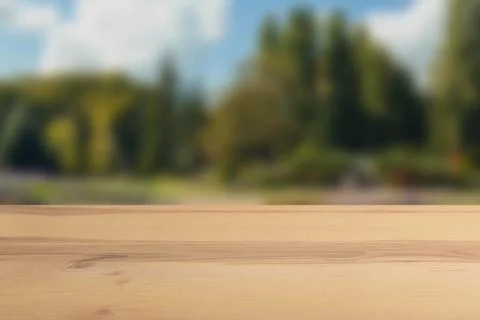Wooden board empty table in front of a blurred background. Perspective brown Foto stock