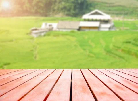 Wooden board empty table in front of blurred background. Stock Photos