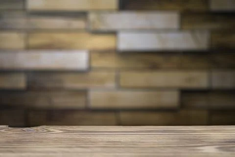 Wooden board empty table in front of blurred background. Perspective brown wo Stock Photos