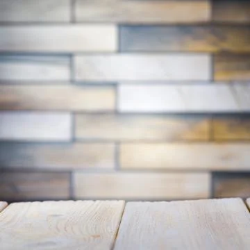Wooden board empty table in front of blurred background. Perspective brown wo Stock Photos