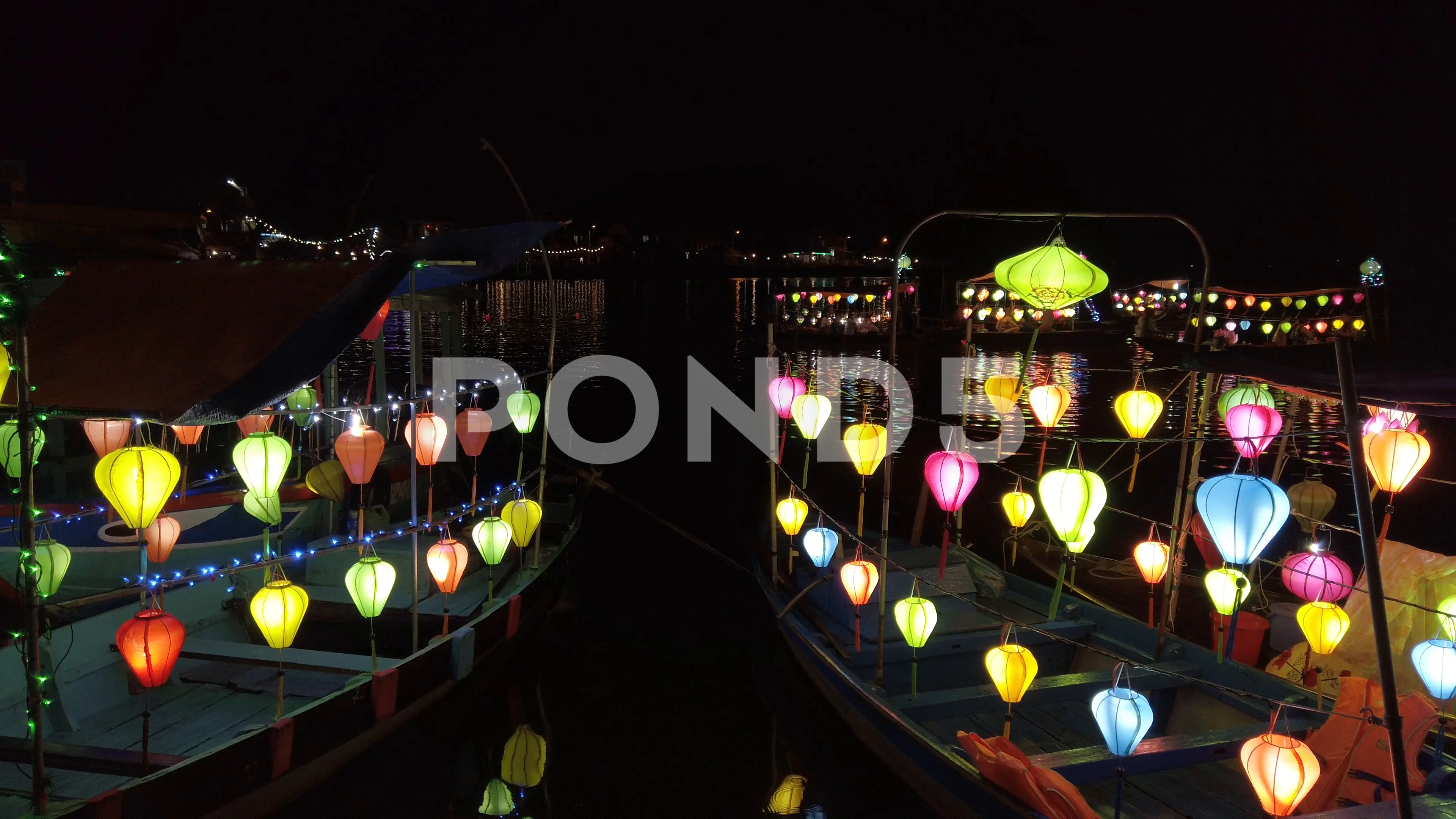 wooden boat illuminated with chinese lanterns light mooder in docks at night, image size:3840x2160