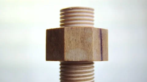 wooden bolt rotating on a white backgrou... | Stock Video | Pond5