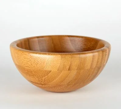 Wooden bowl on white background Stock Photos