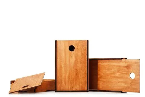 Wooden boxes in different sizes on white background Stock Photos