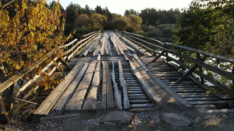 Wooden bridge over the river Stock Footage 162788206