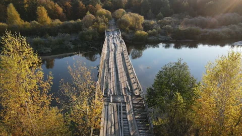 Wooden bridge over the river Stock Footage 162790458