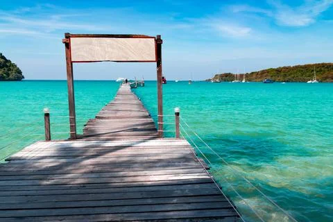The wooden bridge in the sea at Koh Kood is a tropical island Stock Photos