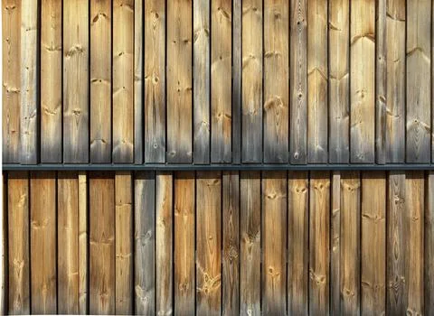 Wooden Building Wall with Vertical Planks and Natural Light Stock Photos