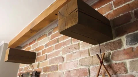 Wooden ceiling beams on a brickwork background Stock Footage 153803634