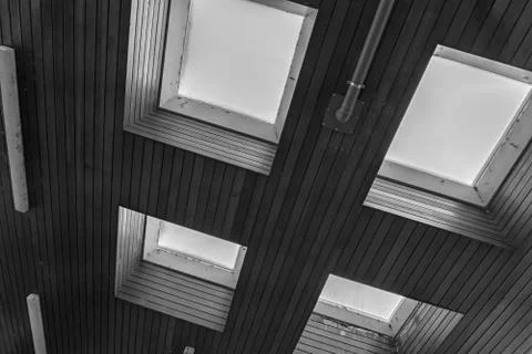 A wooden ceiling with windows Stock Photos
