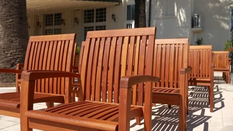 Wooden chairs on the street. Chairs for cafe Stock Footage