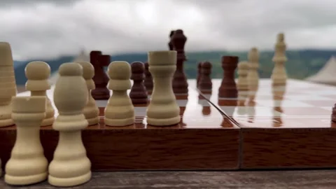 Wooden chess board coffee table in nature meadow traditional scenic landscape Stock Footage 338150826