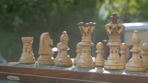 Wooden chess game on a table in a camera slide from left to right. Stock Footage 118677822