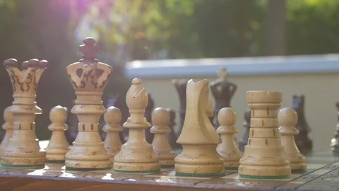 Wooden chess game on a table in a camera slide from right to left. Stock Footage 118694401