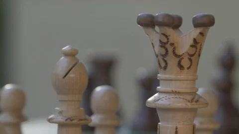 Wooden chess game on a table in a camera slide from left to right. Stock Footage 118717433
