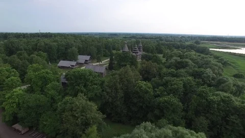 Wooden Christian church Vitoslavlitsy Veliky Novgorod golden ring Russia Aerial Stock Footage