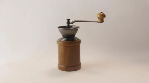 Wooden coffee mill and coffee beans Stock Photos