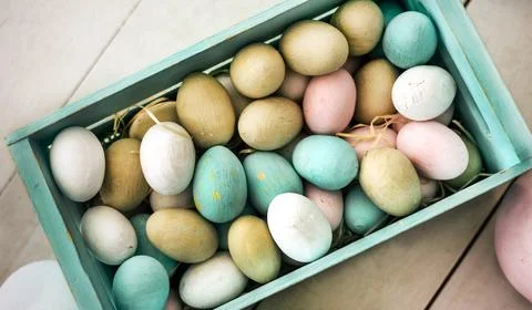 Wooden colored easter eggs Stock Photos