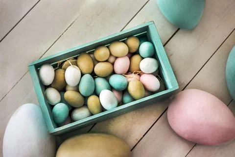 Wooden colored easter eggs Stock Photos