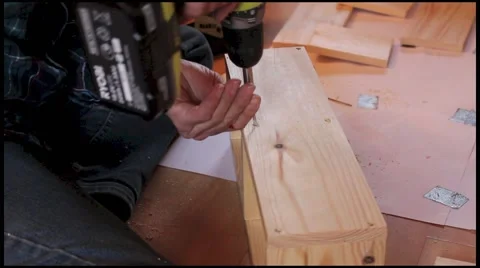 Wooden Construction With Drill, Screw, Worker Stock Footage 49526371