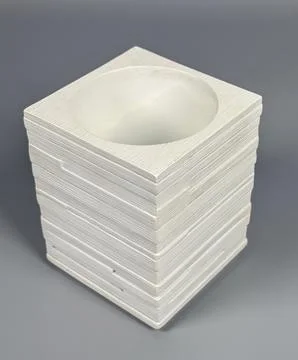 Wooden container stack on gray surface in plain design Stock Photos