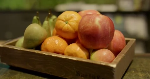 Wooden Crate Full of Fresh Fruit on a Garden Table Vídeo Stock 340280537